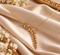 Women's Gold Leaf Pendant Necklace with Stone Accents