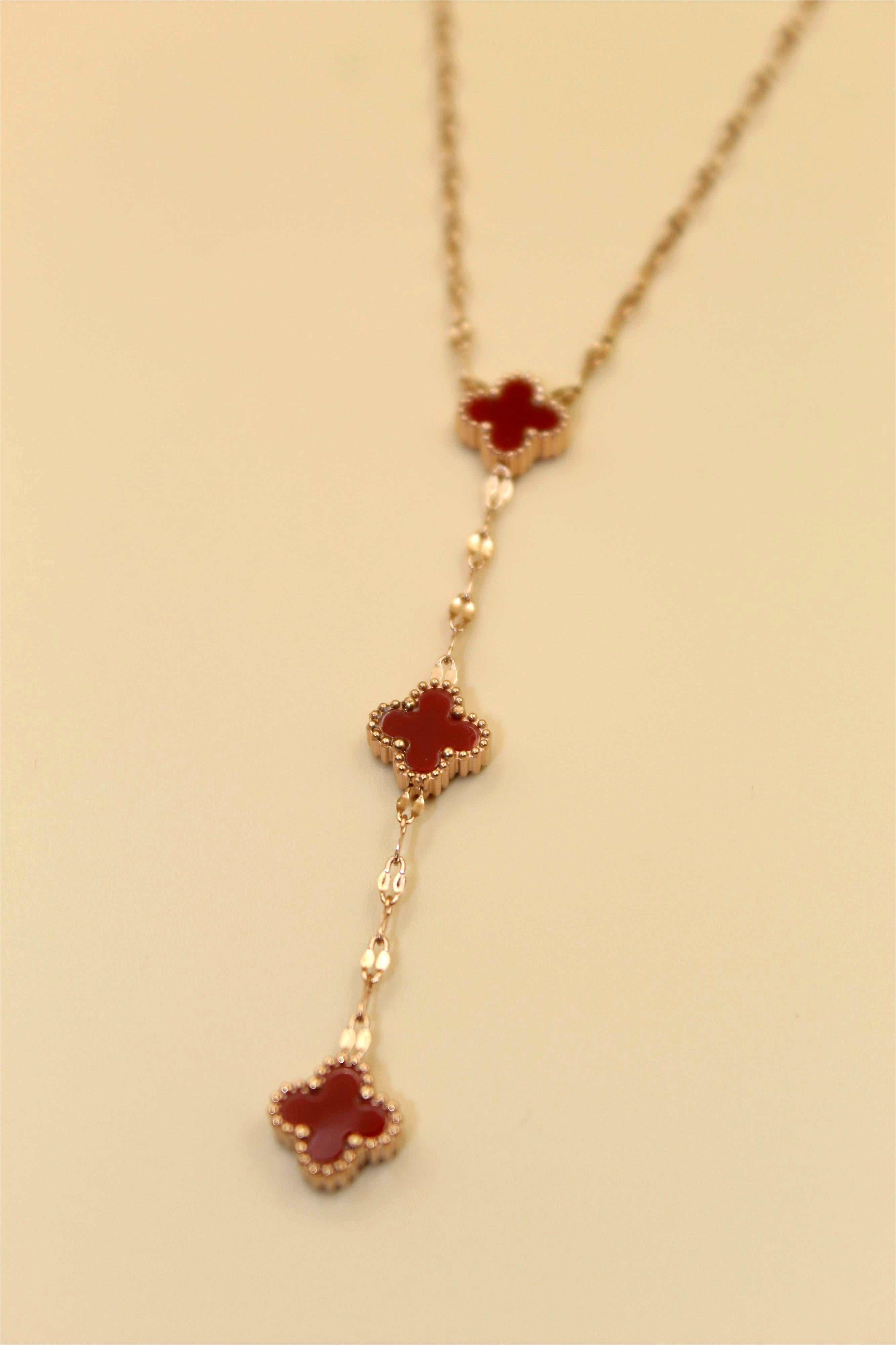 Gold-Tone Chain Adorned With Elegant Red Stone