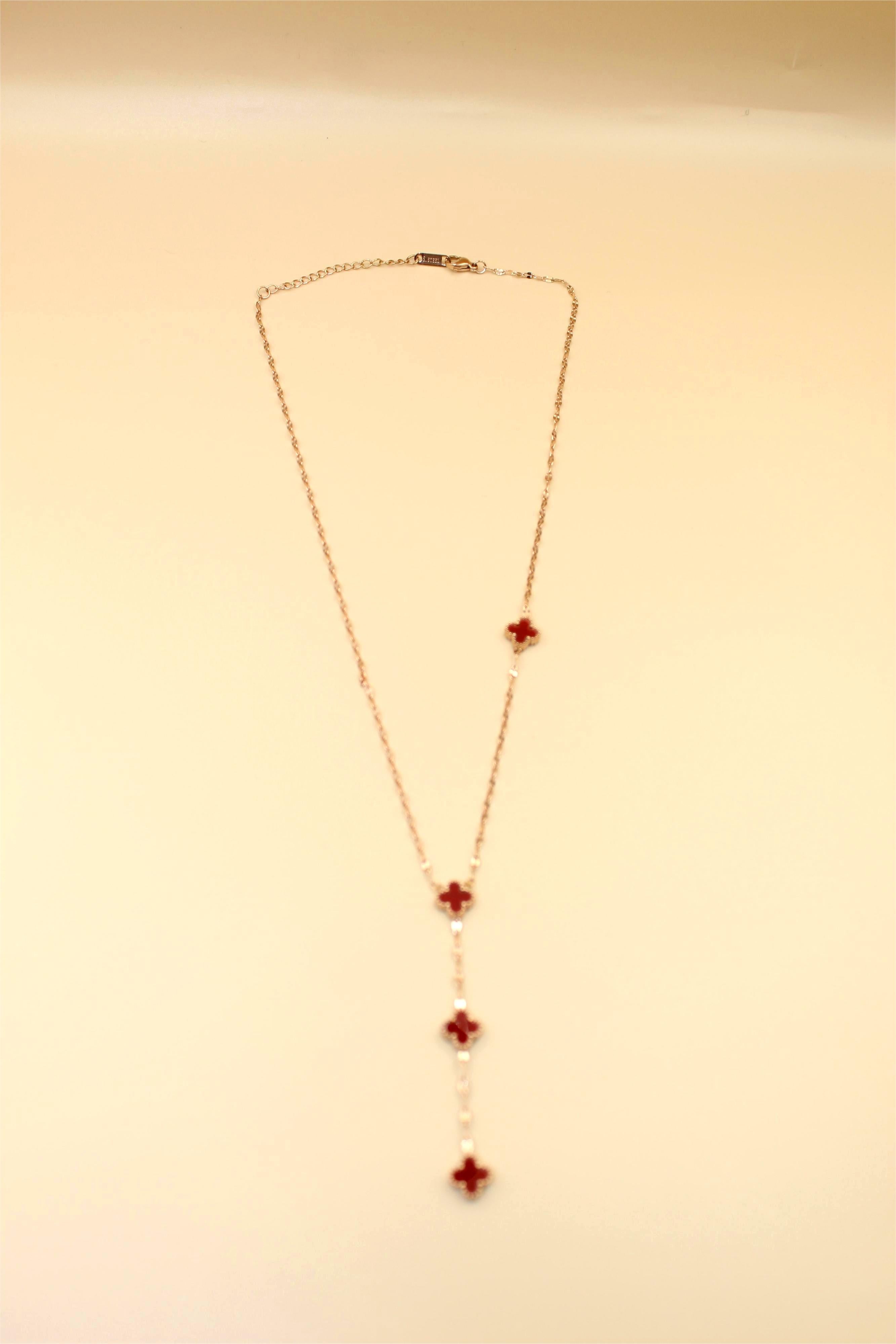 Gold-Tone Chain Adorned With Elegant Red Stone