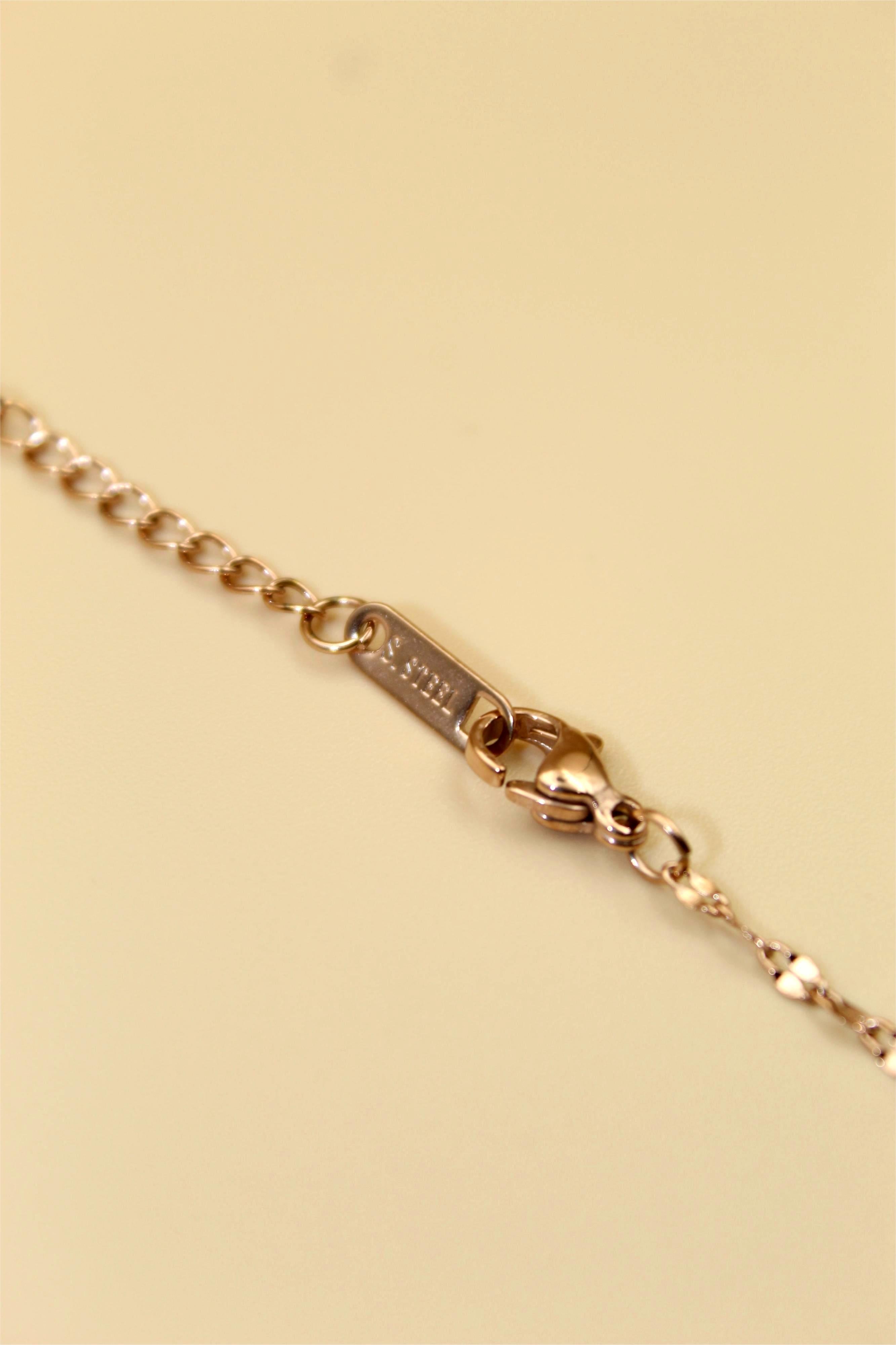 Gold-Tone Chain Adorned with Elegant Black Stone