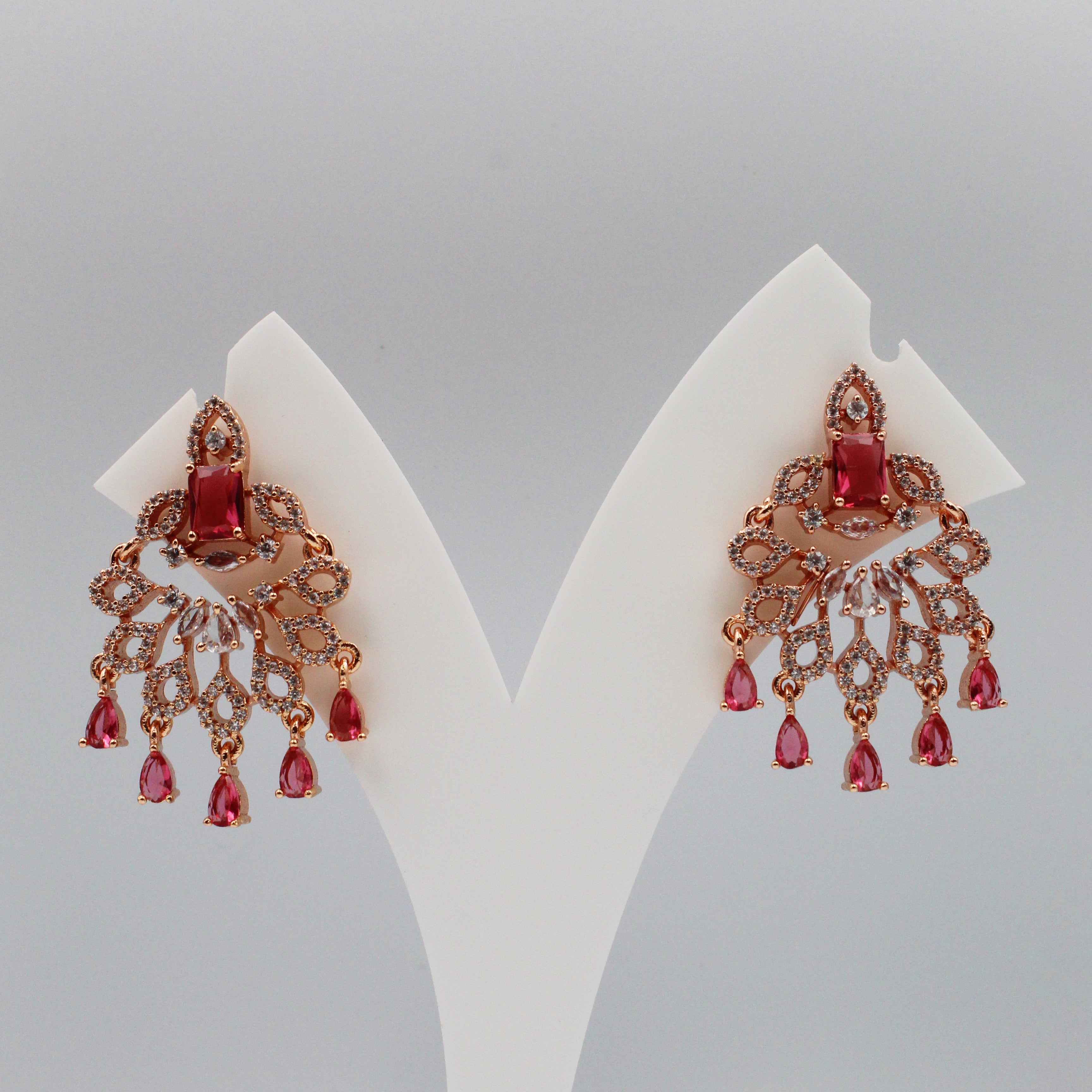 Rose Gold Chandelier Earrings with Red Stones | Designer artificial Jewelry for Women