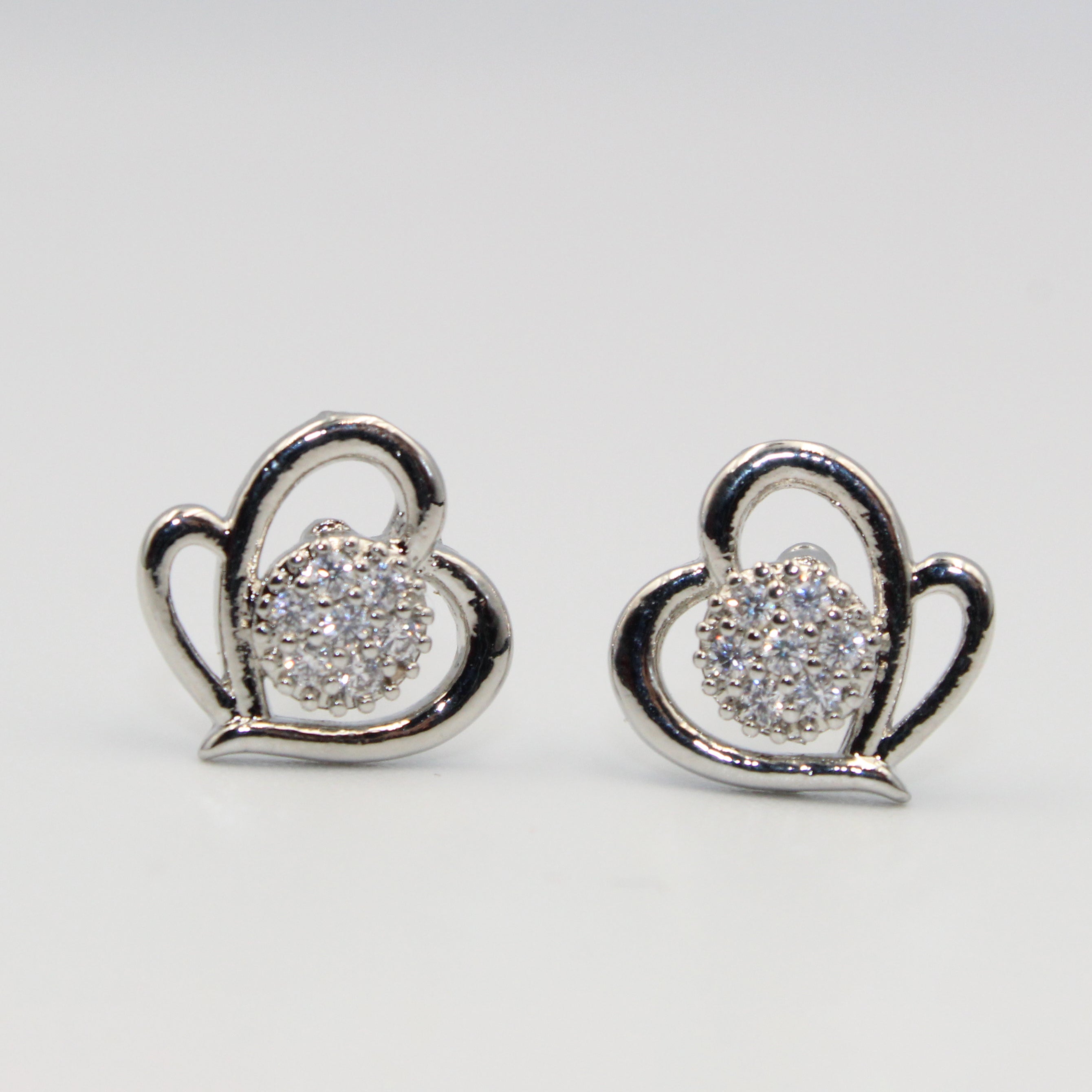 Sparkling Silver Heart Stud Earrings with White Stones | Elegant artificial Jewelry for Women