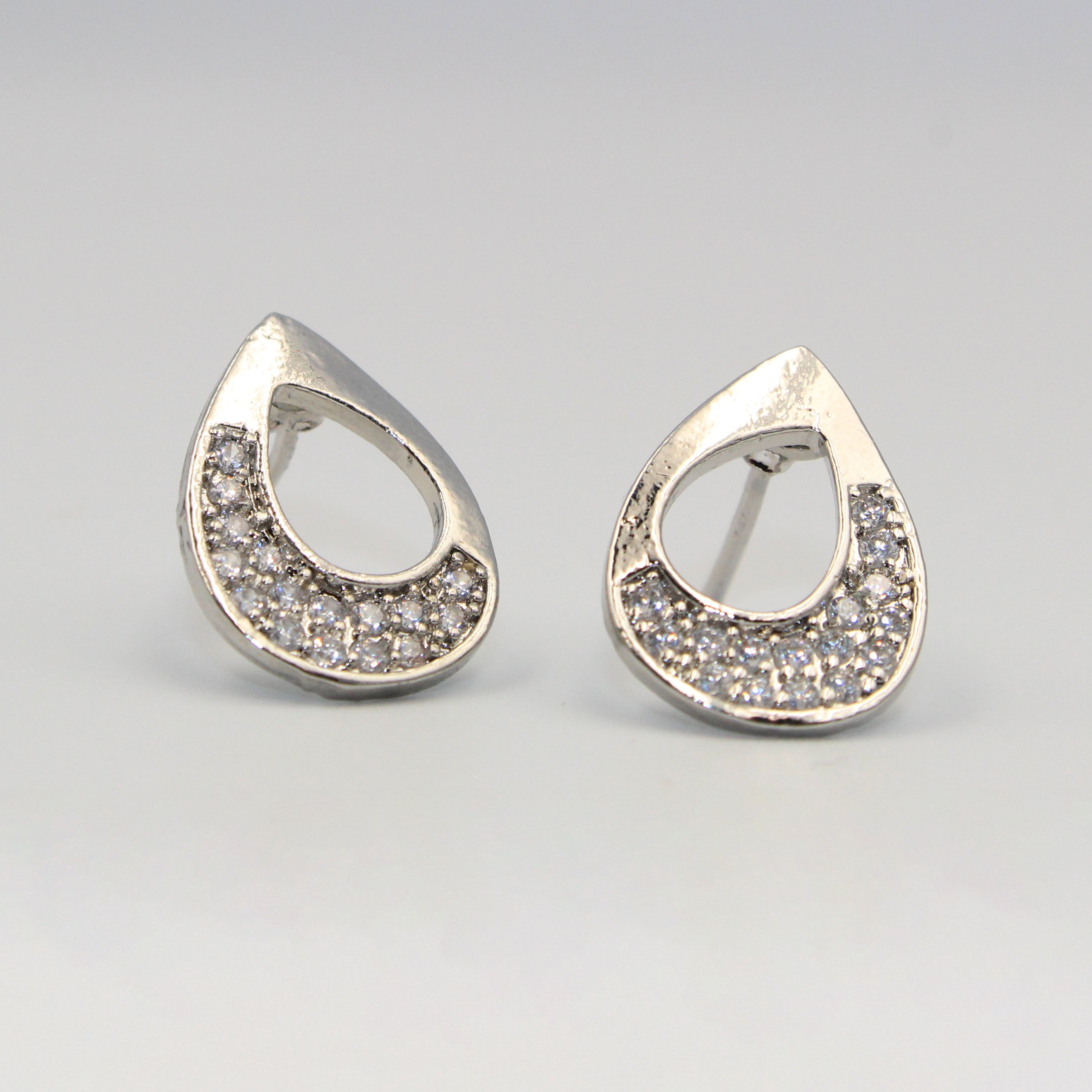 Elegant Silver-Tone Teardrop Stud Earrings with Sparkling White Stones | artificial Jewelry